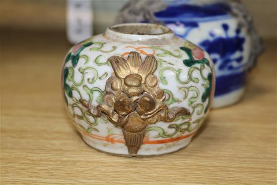 Three Chinese porcelain jars, Qing Dynasty - one crackleglaze, a blue and white and a famille rose example tallest 14cm